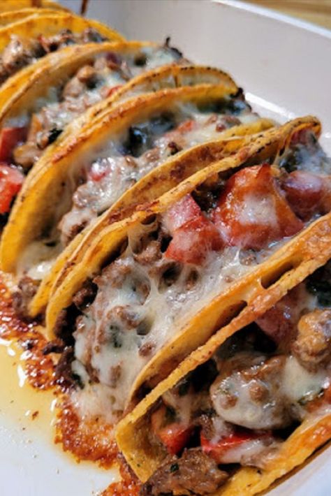 tacos stacked side to side in a baking dish with melted cheese on top Double Decker Tacos, Oven Baked Tacos, Baked Tacos, Tacos Recipes, Food Recipes Easy, Running Mom, Taco Bake, Homemade Tacos, Homemade Taco Seasoning