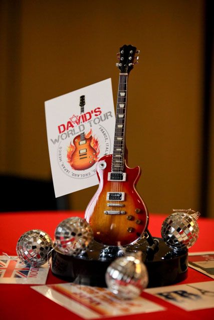 Guitar Party Decorations Ideas, Rock N Roll Centerpiece Ideas, Rock And Roll Centerpiece Ideas, Guitar Centerpiece Ideas, Guitar Centerpieces, Rock And Roll Party Decorations, Unique Table Centerpieces, Bat Mitzvah Decorations, Music Centerpieces