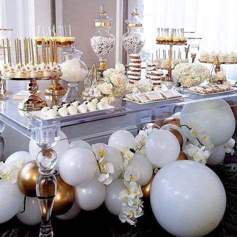 374 Likes, 6 Comments - Amalfi Décor (@amalfi_decor) on Instagram: “Luxury at its finest ✨ White and gold wedding dessert table styled by @itsyourparty_atl with Amalfi…” White Candy Table, Engagement Party Desserts, Gold Dessert Table, Sweets Table Wedding, Wedding Cake Table Decorations, Dessert Stands, Star Baby Shower Theme, Gold Dessert, Cake Table Decorations