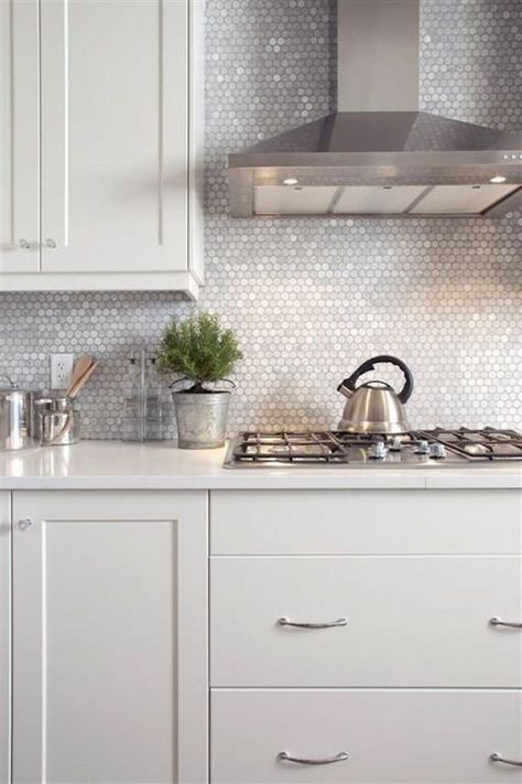 Why This Unexpected Color Trend Is Dominating Your Pinterest Feed Penny Tiles Kitchen, Penny Tile Backsplash, Countertop Concrete, Modern Kitchen Backsplash, Kitchen Splashback Tiles, White Kitchen Backsplash, Penny Tile, Kitchen Backsplash Designs, All White Kitchen