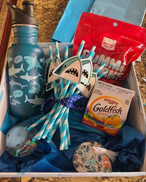 Shark Themed Gift Basket, Ocean Theme Gift Basket, Shark Gift Basket, Shark Presents, Blue Themed Gift Baskets, Beach Themed Food, Gift Theme Ideas, Shark Gift Ideas, Something Out Of The Blue