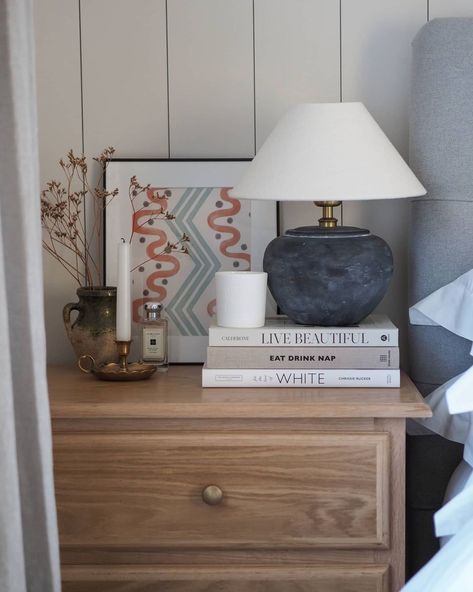 C L A R E on Instagram: “Our new bedside tables arrived this morning & I'm obsesssssed 🙌🏻 New build bedrooms were apparently designed for borrowers so space is…” Bedroom Decor Side Table, Books On Bedside Table, Bedside Table With Books, Plant Bedside Table, Bedside Table Books Aesthetic, Bedside Art, Wallpaper Bathrooms, Wooden Bedside Table Aedthritc, Bedside Table Styling