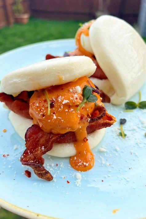 Looking for more breakfast recipe ideas? This Bao buns recipe is a great alternative brunch idea. We love trying new brunch recipes and this pork bao bun is one of our new faves. Breakfast bao buns are a great Asian fusion breakfast idea! If you want more bao buns filling ideas, try this recipe, filling them with our British streaky bacon, fried eggs and crispy chilli oil. #baobun #baobuns #bao #streakybacon #britishbacon #brunch #breakfast #breakfastrecipe Bao Buns Filling, Bao Bun Recipe, Asian Brunch, Bao Buns Recipe, British Bacon, Crispy Chilli Oil, Pork Bao, Bacon Recipes Breakfast, Breakfast Recipe Ideas