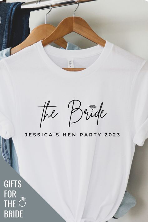 Planning a hen party / bachelorette party? These custom shirts feature a classy design, perfect for a bride and a matching team bride shirts for your bridesmaids. They are super soft and comfortable and perfect to party all night! Visit our store for more oprtions. #Bacheloretteparty #henparty #hennight #bride #bridegifts Hen Tshirt Ideas, Hen Party Tshirt Ideas, Cricut Hen Party Ideas, Hen Do Tshirts, Shirts For Bachelorette Party, Hen Party Tshirts, Classy Hen Party, Bride Tshirt, Team Bride Shirts