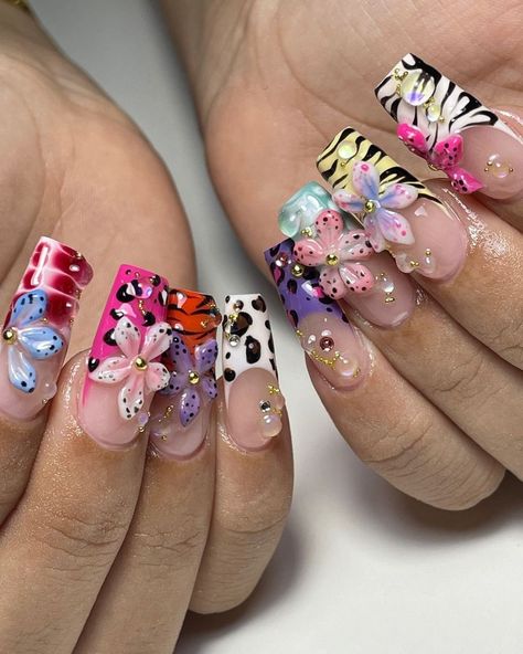 🌸💐 Floral Fiesta Press-On Nail Set | Vibrant 3D Flower Designs with Butterfly Accents 🦋🌼 Dive into a world of color and creativity with our Floral Fiesta Press-On Nail Set! Perfect for the fashion-forward and the floral enthusiasts, these nails bring a burst of life to any outfit, making every day feel like a garden party. 🎨🌺 Key Features & Highlights: Vibrant 3D Flower Designs: Each nail features stunning 3D flowers, meticulously crafted and placed for maximum impact. The vibrant colors a Colored 3d Flower Nails, Flower Garden Nails, Acrylic Nails Fairy, Builder Gel Flower Nails, Flower Fairy Nails, Colorful Flower Nails, Colorful 3d Flowers Nails, Party Nails Designs, 3d Floral Nails