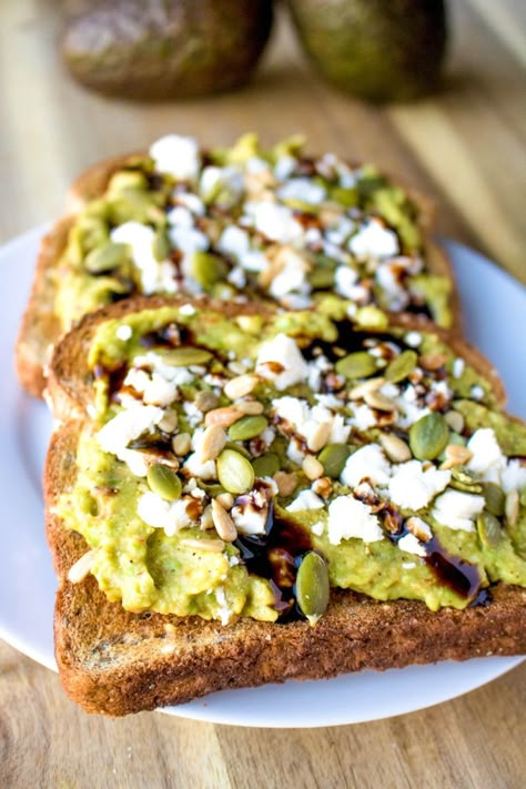 Avocado Toast With Feta, Toast Recipe Breakfast, Packed Breakfast, Avocado Toast Recipe, Toast Toppings, Breakfast Toast, Chili Paste, Balsamic Glaze, Avocado Recipes