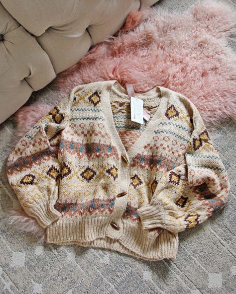 The softest thick & cozy knit pairs with Nordic & Fair Isle designs, a toggle button-up front, v-neck bust & oversized fit. Color: Sand & multi Acrylic blend Imported Hand wash cold Small Med Large Bust 44 46 48 Waist 44 46 48 Hips 44 46 48 Length 26 26 26 Bust, waist, and hip measurements are a total circumference. Length is measured from the top of the sweater to the hem. Measurements are an estimate. Cabin Sweater, Snowy Cabin, Warm Cardigan, Toggle Button, Color Sand, Cozy Knit, Cozy Knits, Winter Knits, Large Bust