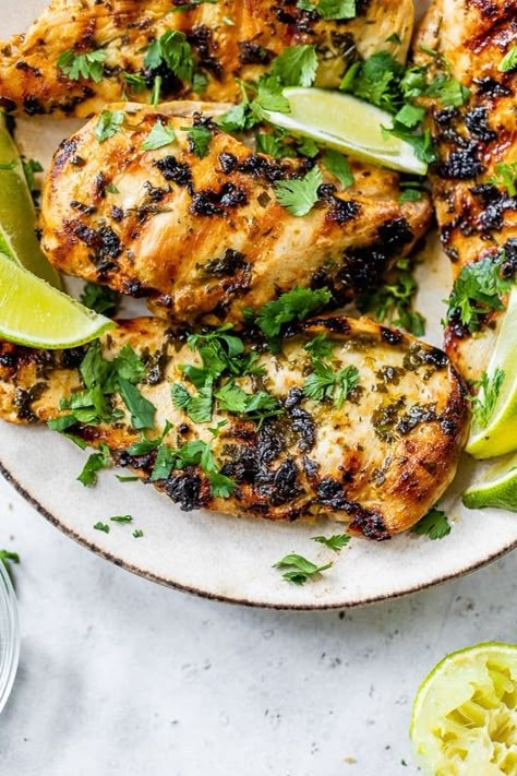 Cilantro Lime Chicken Breast is marinated in olive oil, lime juice, lime zest, garlic, and cilantro and cooked in the air fryer or on the grill/grill pan. #cilantrolimechicken #chicken #chickenbreast #grilledchicken #healthyrecipes Skinnytaste Air Fryer Chicken Bites, Grilled Chicken And Green Beans, Lime Chicken Breast Recipes, Pollotarian Recipes, Flavorful Chicken Breast Recipes, Panera Salad, Lime Chicken Breast, Cilantro Chicken, Cilantro Lime Chicken