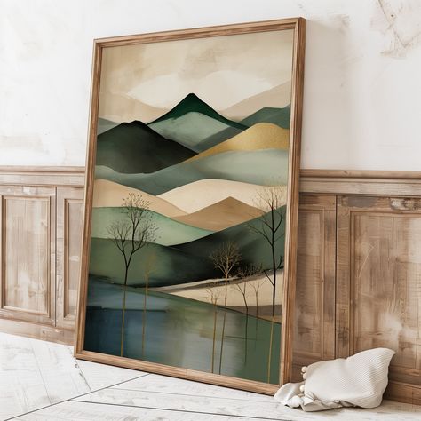 This stunning Japandi wall art beautifully combines Scandinavian minimalist design with Japanese wabi-sabi aesthetics. The artwork features a stylized abstract landscape of layered hills in calming tones of beige, green, and black, accented with subtle touches of gold. Bare trees stretch gracefully across the composition, their reflections mirrored in the water below, creating a tranquil, nature-inspired scene. Perfect for those seeking serene, modern decor, this piece captures the essence of Ja Scandinavian Artwork, Tranquil Nature, Japandi Interior Design, Bare Trees, Japandi Wall, Japandi Wall Art, Japandi Interior, Scandinavian Minimalist, Japanese Decor