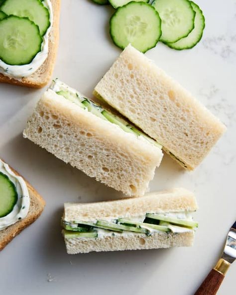 closeup shot of stacked cucumber sandwiches Cucumber Sandwiches Recipes, Cucumber Tea, Finger Sandwich, Cucumber Tea Sandwiches, Tea Party Sandwiches, Tea Sandwiches Recipes, Pizza Roll, Chicken Baked, Brunch Spread