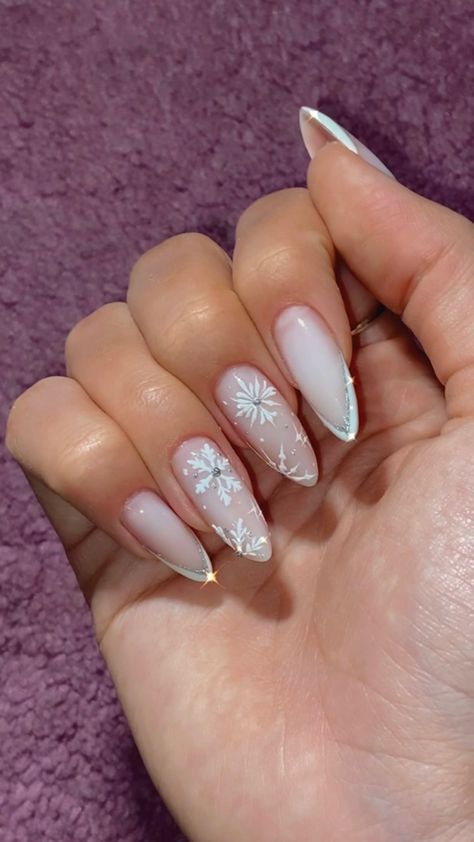 Festive White Nails, Snowflake Nails With Rhinestones, Snowflake Stiletto Nails, Snow Queen Nails, Almond Nails Snowflakes, Ice Princess Nails, Snow Themed Nails, Icicle Nails Acrylic, Sparkle Snowflake Nails