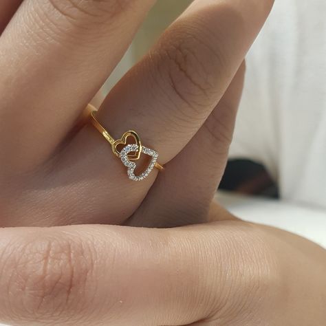 We put our hearts and souls into creating jewelry that will resonate with your spirit. Beautiful jewelry enhances the beauty of your soul. Add a touch of luxury to your life with our exquisite gold jewellery collection. Because you are worth it! 💛 Beautiful 14k Gold & diamond ring with GIA certified diamonds❤️ To order, DM us on Instagram or WhatsApp at 7339756707. Payment modes - Bank transfer, Paypal, Paytm, GPay, UPI, Cards, COD #instalike #instagram #reels#jewellery #jewellerylover ... Diamond Rings Heart, Gold Fancy Rings, Gold Ring Collection, Beautiful Ring Designs, Heart Ring Design, Simple Ring Design, Dimond Ring, Gold Jewellery Collection, Fancy Diamond Ring