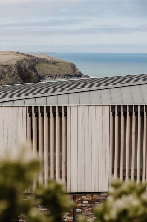 To create privacy for the first floor, we clad the windows on the public facing facade of this new house with wooden louvres. The beautiful Western Red Cedar cladding has silvered and compliments the shallow pitch zinc roof. Check our website to see more. Cedar Cladding House, Wooden Louvres, Surfboard Room, Western Red Cedar Cladding, New Build House, Zinc Cladding, Louvre Windows, Roof Cladding, Grass Roof