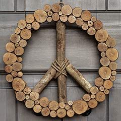 Wood Peace Sign, Peace Sign Wreath, Disc Art, Stick Projects, Olive And Cocoa, Woodland Retreat, Peace Sign Art, Twig Art, Wood Wreath