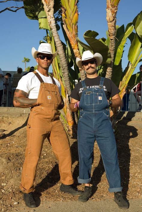 Tap to see all of our favorite looks from Tyler, the Creator’s festival. Cowboy Overalls Outfit, Festival Overalls Outfit, Cowboy Festival Outfit Men, Cute Cowboy Outfits, Carhartt Overalls Outfit Men, Carhartt Cowboy, Carhartt Overalls Outfit, Western Outfit Men, Cowboy Fits