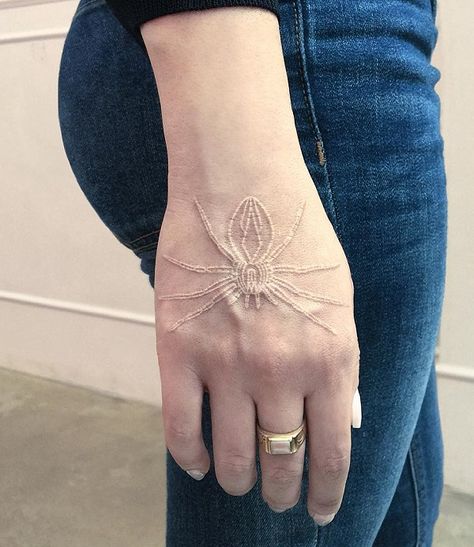 Spider white ink hand tattoo - 60 Eye-Catching Tattoos on Hand White Ink Hand Tattoo, Hand Tattoos Ideas, Tattoos On Hand, Scar Tattoo, White Spider, White Ink Tattoo, Hand Tats, Writing Tattoos, Spider Tattoo