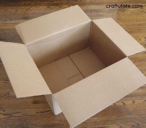 Cardboard Box Boat - a fun toy to make for kids! Cardboard Box Boats Diy, Cardboard Box Boat Diy, How To Make A Boat Out Of Cardboard, Cardboard Boat Diy, Making A Boat Out Of Cardboard, Cardboard Box Boat, Diy Boat Craft, Cardboard Box Boats, Cardboard Boxes Kids