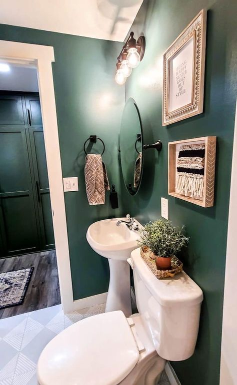 Get ready to be blown away with this small bathroom makeover! This makeover is sure to give you all sorts of inspirational ideas for your next renovation! #bathroom #ideas #bathroominspo #smallbathroom #darkgreenwalls #greenbathroom Green Small Bathrooms, Green Bathrooms Inspiration, Bathroom Paint Color Ideas, Green Bathroom Paint, Small Dark Bathroom, Bathroom Paint Color, Small Bathroom Paint, Dark Green Bathrooms, Green Bathroom Decor