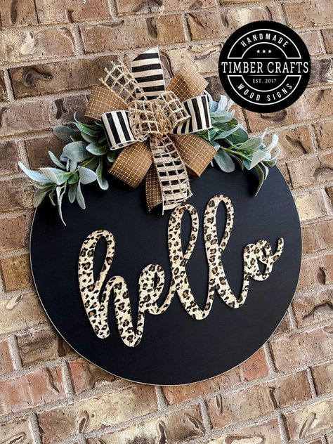 Round Door Hangers Wooden Last Name, Black Door Hangers Wooden, What Type Of Wood To Use For Door Hangers, Hello Welcome Sign, Wooden Circle Crafts Diy, Front Door Wooden Signs, Office Door Hanger Ideas, Yellowstone Door Hanger, Diy Door Signs Front Porches