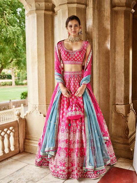 Gorgeous hot pink lehenga with blue dupatta. See more on wedmegood.com  #wedmegood #indianwedding #indianbride #lehenga #lehengacholi #bridallehenga #bridallehengacholi #pink #blue Lehenga Color Combinations, Orang India, Indian Outfits Lehenga, Lehnga Dress, Bridal Lehenga Collection, Designer Bridal Lehenga, Indian Bridal Lehenga, Anita Dongre, Blue Lehenga