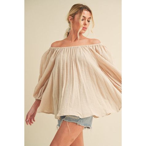 An off-shoulder balloon sleeve blouse is a feminine and stylish top that features a neckline that sits off the shoulder, exposing the shoulders. The sleeves are typically voluminous and puffed, resembling a balloon shape. This style adds a touch of sophistication and flair to your outfit, making it a popular choice for both casual and dressy occasions. It pairs well with high-waisted bottoms such as jeans, skirts, or trousers for a chic and trendy look. Features: Basic style Sheer: Opaque Stretc