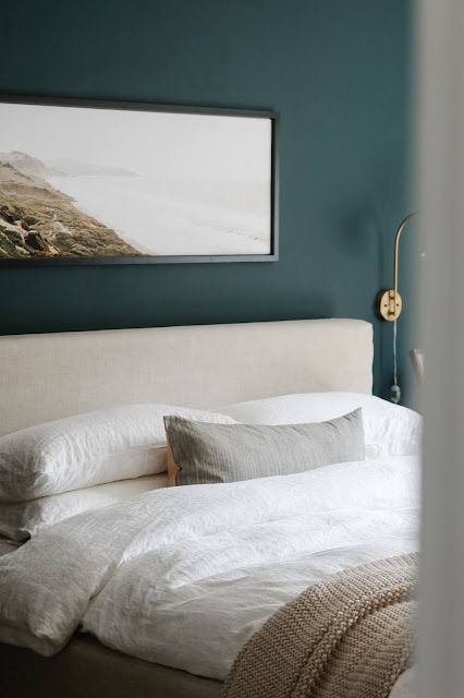 If you're looking for a modern bed that will stand the test of time, check this out! A primary bedroom refresh to inspire... Mirror Above Bed, Hutchinson House, Bed Slipcover, Slipcovered Bed, Bedroom Above Bed, Creative Headboard, Above Bed Art, Dark Green Walls, Linen Headboard