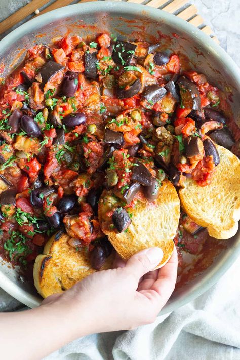 Eggplant caponata is an easy Sicilian appetizer that's full of flavor. It's vegan and you can serve it as a healthy dip with some crusty bread. It's a great addition to the dinner table and takes less than an hour to make. Serve caponata warm or cold, as an appetizer or a flavorful side dish! Italian Eggplant Recipes, Vegetarian Eggplant Recipes, Eggplant Caponata Recipe, Vegan Eggplant Recipes, Caponata Recipe, Aubergine Recipe, Eggplant Recipes Easy, Eggplant Caponata, Eggplant Recipe