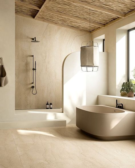 #SpaBathroom #MinimalistDesign #NaturalStone #OrganicInteriors #BathroomGoals #HomeSpa #RelaxingSpaces #ModernBathrooms #InteriorDesign #HomeInspiration Brown Tiles Bathroom, Natural Stone Bathroom Ideas, Beige Bathroom Tiles, Greige Bathroom, Organic Bathroom, Natural Stone Bathroom, Relaxing Bathroom, Modern Bathtub, Modern Lake House