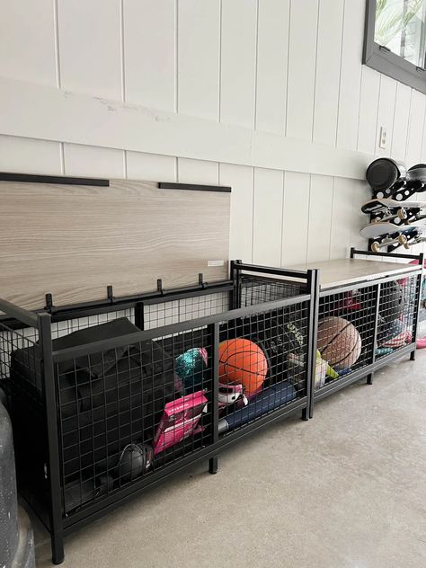 11 garage organizers that changed the way our garages functions using storage solutions for tools, paint, and sporting equipment. Above Garage Storage, Craftsman Garage Organization, Toy Storage In Garage, Garage Baseball Organization, 3 Car Garage Ideas Interior, Sports Clothes Organization, Garage Storage Lockers, Garage Storage Shoes, Shoe Garage Storage Ideas