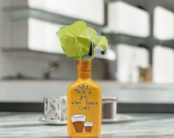 Introducing our delightful hand-painted bottle that exudes both humor and warmth! With a mustard and yellow color palette, this upcycled small Rum bottle proudly declares, "Who needs a guy if there is chai." Whether displayed as a unique decor item or used to savor your favorite beverage, this bottle is a lighthearted reminder of the power and comfort found in a simple cup of chai. Spread laughter and celebrate the love for chai with this quirky masterpiece! Quilt Boards, Beer Painting, Yellow Color Palette, Rum Bottle, Painted Bottle, Color Palette Yellow, Gift Art, Lovers Gift, Mustard Bottle