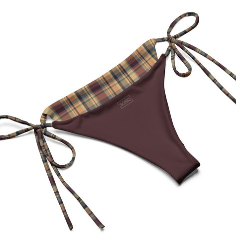 Our Earthy Plaid String Bikini is a classy and thoughtful piece. It’s made from soft recycled polyester with double-layering and UPF 50+. Style the straps how you like, and get ready to swim! Designed by BOHIQ Bikini top with removable padding Pattern: Earthy Tones Plaid UPF50+ protection Sizes 2XS to 6XL Runs Big Fabric Layers: Double Fabric: 81% recycled polyester, 19% Lycra spandex OEKO-TEX 100 standard certified Global Recycled Standard (GRS) certified Multiple ways to tie and style the bikini set Care instructions: Thoroughly rinse it off after each use and get rid of any chlorine/salt residue. Cute Swim Suits, Plaid Bikinis, Planet Love, Crochet Swim, Best Swimsuits, 50 Style, Red Gingham, Cute Swimsuits, Swimwear Brands