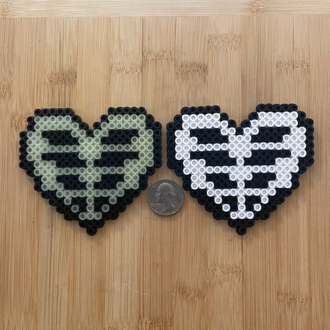 Ribcage Heart Perler Bead magnets. Approximately 4x3.5 inches. I also take custom request for ornaments. Perler Bead Magnets, Melty Bead Designs, Melt Beads Patterns, Pixel Beads, Melty Bead Patterns, Pearl Beads Pattern, Easy Perler Beads Ideas, Perler Art, Fusion Beads