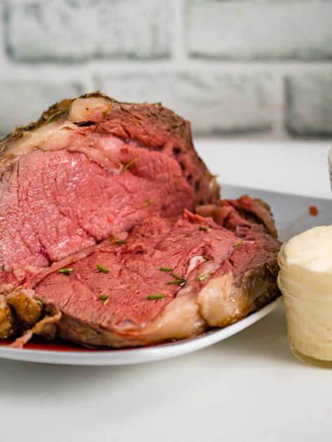 Sous vide prime rib is perfectly cooked beef! Cook your standing rib roast with a sous vide for tender and delicious beef cooked exactly how you want it. The perfect centerpiece for a holiday celebration! Sous Vide Recipes Beef, Sous Vide Roast Beef, Sous Vide Prime Rib, Sous Vide Ribeye, Sous Vide Steak, Standing Rib Roast, Prime Rib Recipe, Sous Vide Recipes, Prime Rib Roast