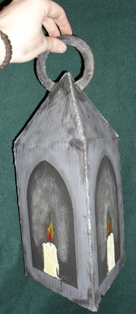 DIY: Victorian Candle Lantern made from cardboard.  Inexpensive.  Halloween Horrors in Victorian London Party Decorating & Ideas Cardboard Lantern, Victorian Candle, Victorian Candles, Cardboard Props, Set Construction, Play Props, Theatre Props, Medieval Party, Creepy Costumes