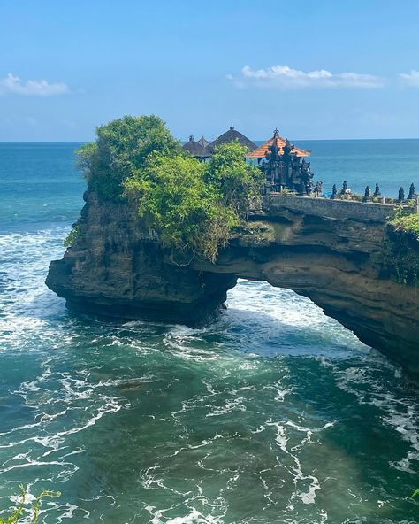 Batu Bolong Temple stands on a unique rock formation with a natural hole, overlooking the ocean. Not far from Batu Bolong, is the Tanah Lot temple (meaning Land in the Sea) an ancient Hindu temple dedicated to the guardian gods of the sea, it contains the Holy Water Cave with natural spring inside. #tanahlot Water Cave, Tanah Lot Temple, Natural Spring, Gold Coast Australia, Hindu Temple, Holy Water, Spring Nature, Rock Formations, Gold Coast