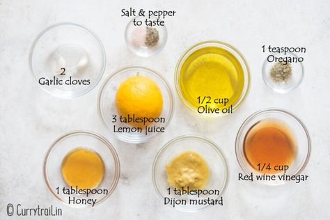 all ingredients for Greek style salad dressing on board Easy Greek Salad Dressing, Vinegrette Salad Dressing, Vinegrette Recipe, Easy Greek Salad, Greek Salad Dressing Recipe, Vinegar Salad Dressing, Champagne Vinaigrette, Greek Salad Dressing, Champagne Vinegar