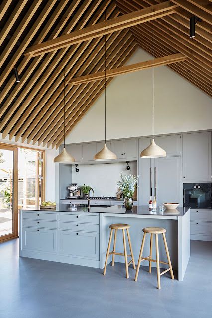 Barn House Kitchen, Mountain House Interior, Kitchen With High Ceilings, Vaulted Ceiling Kitchen, Scandi Kitchen, Barn Kitchen, Barn Interior, Modern Barn House, Wooden Bar Stools