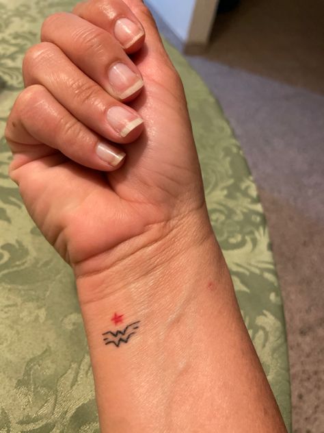 Small Superman Tattoo, Superwoman Tattoo Ideas, Small Wonder Woman Tattoo, Superwoman Tattoo, Wonder Woman Tattoos, Wonder Woman Tattoo, Superman Tattoos, Tattoos For Women Small Meaningful, Awareness Tattoo