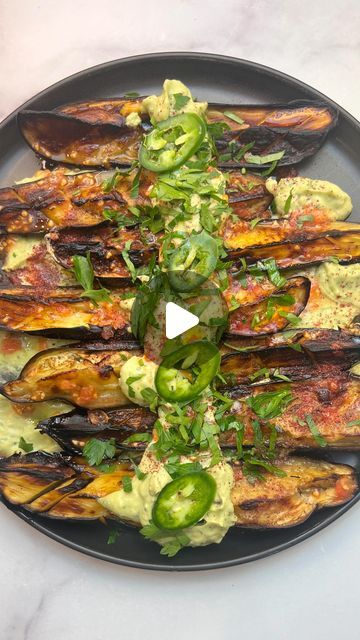 RUHAMA SHITRIT on Instagram‎: "ROASTED EGGPLANT WITH AVOCADO CREAM!🥑
If you want to impress your guests you must try this eggplant dish! 
Roasted eggplants with avocado cream - a vegan dish that you are going to love!
Follow @ruhamasfood for more💜
SAVE THIS RECIPE 👇
.
.
חצילים צלויים על קרם אבוקדו! 
מתכון בתגובות👇
.
.
Recipe:
Ingredients-
2 eggplants
5 tablespoons of olive oil 
1 teaspoon of kosher salt 

Avocado -Tahini Dressing:
2 avocados 
2 garlic cloves 
1/4 sweet onion 
Handful of parsley 
1 teaspoon of salt 
Juice from 1 lemon 
3 tablespoons of olive oil
1/3 cup of tahini 
3/4 cup of cold water 
Put all the ingredients in a food processor and mix it to a smooth dressing. If the dressing is too thick, add some water to dilute it. 

Garnish- 1 grated Campari tomato, handful of cho Eggplant Salad Recipes, Shabbat Dinner Recipes, Roasted Eggplant Recipes, Shabbat Dinner, Eggplant Salad, Eggplant Dishes, Avocado Cream, Roasted Eggplant, Roast Eggplant