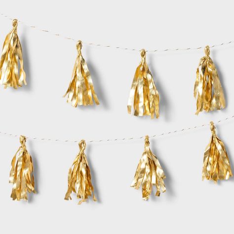 Transform any celebration into a dazzling affair with the Metallic Gold Tassel Garland from Spritz™. This elegant garland features shimmering metallic gold tassels to add glamor to your party decor. With its easy setup and practical design, the metallic gold tassel garland from Spritz™ is an ideal choice for birthdays, weddings, graduations and more. Golden Party Ideas, Golden Birthday Ideas For Him, Fearless Birthday Party, Golden Birthday Decor, Golden Year Birthday Ideas, Gold 21st Birthday Decorations, Gold Classroom Decor, Golden Birthday Ideas, Gold Themed Birthday Party