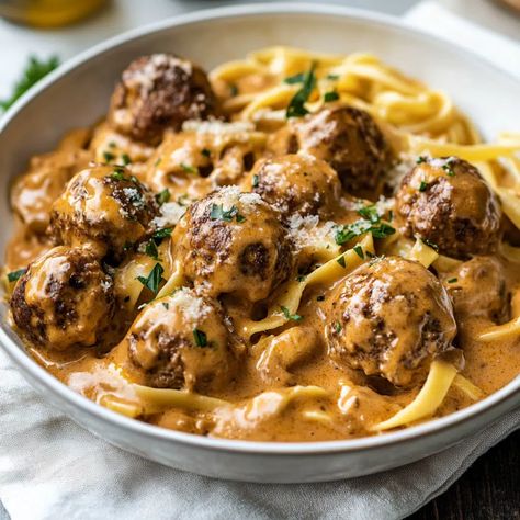 Meatball Stroganoff Recipe - sandyrecipes.com Strogonoff Meatballs, Angus Meatball Recipes, Meatball Stroganoff Crockpot, Stragonoff Recipe, Meatball Stroganoff Recipe, Stroganoff Meatballs, Crock Pot Stroganoff, Frozen Italian Meatballs, Meatball Stroganoff