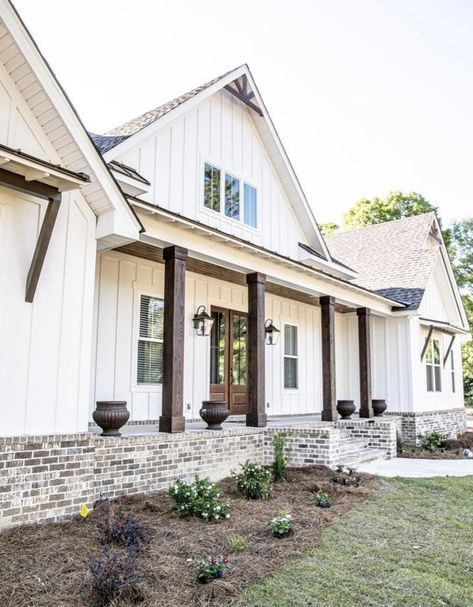 Back Porch Siding Ideas, White Board And Batten Exterior With Wood Accents, Farmhouse Brick Front Porch, Hardi Siding Exterior, Exterior Brick Accents, White House With Brick Accents Exterior, Modern Farmhouse Exterior Colors White, Contemporary Farmhouse Exterior Design, Farmhouse Exterior Paint Ideas