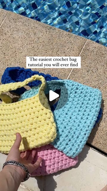 𝓫𝔂𝓰𝓪𝓵𝓴 | Crochet Patterns for Beginners on Instagram: "CROCHET A BAG👇 This is a super easy crochet bag pattern called “Trendy Mini Handbag” 🎀 It is a super cute mini crochet handbag that is perfect for everyday use! 👜 This pattern is perfect for beginner crocheters & the pattern teaches you exactly how to make the bag step by step. Get the pattern linked in my bio! 🎀 I have had many people tell me that this pattern was their first crochet project ever! Give it a try! 🌷 MATERIALS: If you would like a more lightweight bag use 2 strands of cotton ribbon yarn 🧶 if you would like a thicker & sturdier bag you can use 1 strand of T-shirt yarn! #crochet #crochetbag #crochetbags #crafts #easycrochet #crochettotebag #crochettutorial #crochetinspiration #crochetersofinstagram #crochetpatt T Shirt Yarn Bags Free Pattern, T Shirt Crochet Bag, T Shirt Yarn Crochet Bag Pattern Free, First Crochet Project For Beginners, T Shirt Yarn Crochet Bag, T Shirt Yarn Bag, Cute Mini Crochet, First Crochet Project, Crochet A Bag