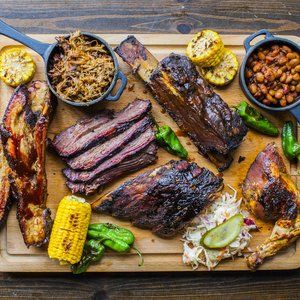 The Blues Kitchen Shoreditch - Thrillist London Grilled Platter, Bbq Platter, Baked Beans With Bacon, Mixed Grill, Grilled Chicken Thighs, Meat Platter, Smoked Brisket, Bbq Restaurant, London Food