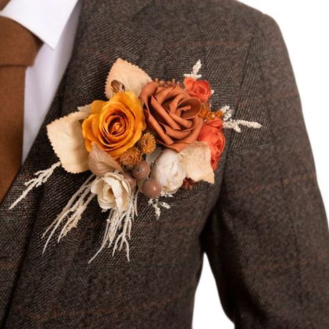 PRICES MAY VARY. Size: The pocket square boutonniere is approx. 6" W x 5" H. Combination of flower and card, the groom can easily put the boutonniere into suit jacket pockets. Material: The boutonnieres are made of amber rose, orange rose, brown berries, pearl floral pick, and beige pampas grass. Great Design: A luxurious boutonnieres designed for the groom. The unique design is convenient for the groom to wear and also allows him Pre-made & Convenient: The boutonniere for men will never wilt an Terracotta Boutonniere, Burnt Orange Boutonniere, Pocket Square Boutonniere, Square Boutonniere, Anniversary Dinner Party, Boutonniere Boho, Orange Boutonniere, Pocket Boutonniere, Wedding Color Pallet