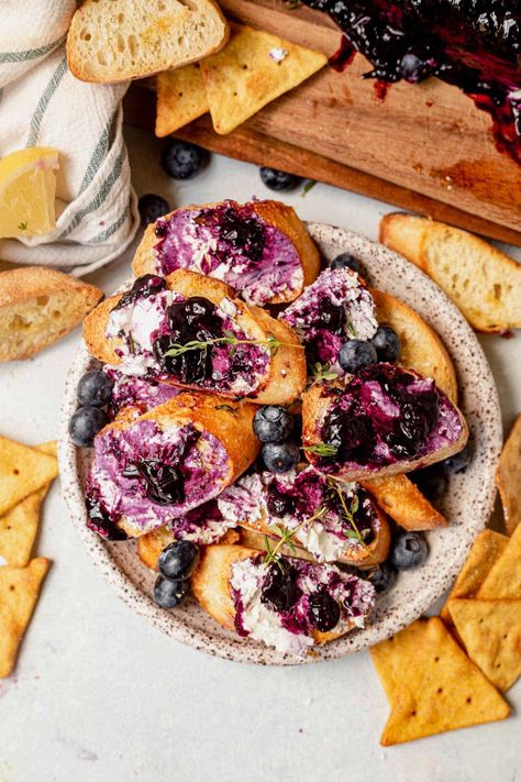 This blueberry goat cheese recipe features creamy goat cheese, fresh herbs, and delicious, tangy blueberries. It's a delicious spread that makes the perfect appetizer, dessert cheese, or addition to your charcuterie board.rn Goat Cheese Recipes Charcuterie, Blueberry Vanilla Goat Cheese, Goat Cheese Log, Blueberry Goat Cheese, Fried Goat Cheese, Creamy Goat Cheese, Cheese Log, Appetizer Dessert, Blueberry Topping