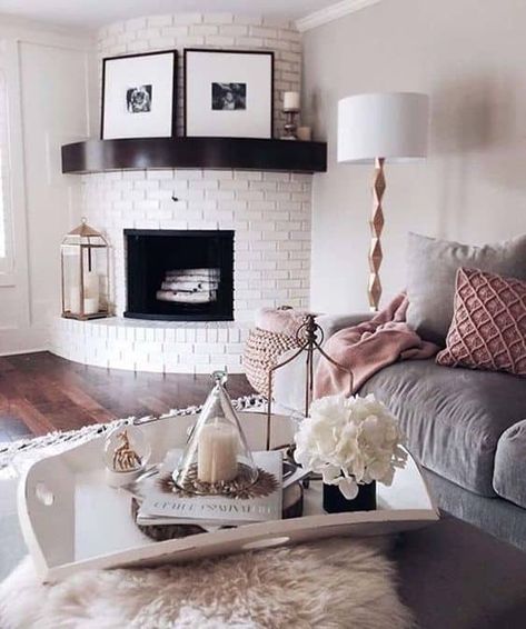 Fireplaces are amazing – whether you’re looking for a romantic evening with your partner, planning to tell an exciting story to your grandkids, snuggl... | Circular Corner Fireplace #CornerFireplace #Corner #Fireplace #FireplaceIdeas #FireplaceCorner #DecoratedLife Round Corner Fireplace Ideas, Curved Brick Fireplace, Remodel Corner Fireplace, Curved Corner Fireplace, Curved Fireplace Mantle, Corner Brick Fireplaces, Corner Fireplace Design, Fireplace Round, Round Fireplace