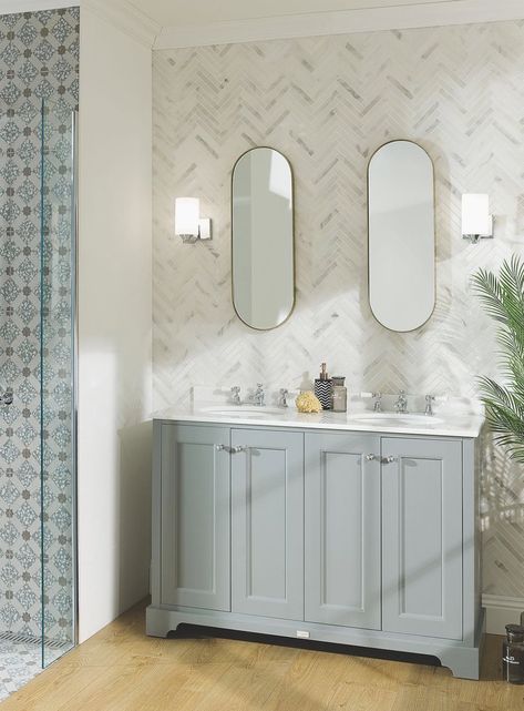 White tiling adds freshness to this modern bathroom, and looks fresh when combined with a soft grey vanity unit. Find more beautiful bathroom designs at UK Bathrooms Featuring cabinetry by Bayswater Bathrooms #bathroomvanity #vanityunit #bathroombasin #basinunit #basin #tiledwall #whitetiles #bathroomtiles #showerwallpaper #bathroomdesign #bathroomremodel #bathtroominspo #bathroomideas #bathroomreno #modernbathroom #bathroomdecor #designlife #bathroomrenovation White Tiled Bathroom, Traditional Bathroom Design, Edwardian Bathroom, Grey Vanity Unit, Marble Worktop, Victorian Style Bathroom, Vintage Inspired Bathroom, Tiled Bathroom, Marble Worktops