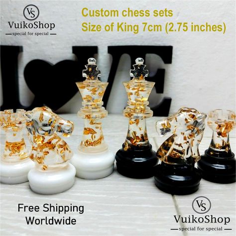 Custom resin chess set in different colors. Just write us the colors you would like.  A photo of ready chess pieces will be sent to you before delivery, so you can check whether everything is as you wish. Dimensions of chess pieces: Diameter of base - 23mm Height - from 35mm (pawn) to 70mm (King). 2 sizes of custom resin boards are available : 10.6 * 10.6 inch (27 * 27cm). Square size - 3*3 cm. 12.4 * 12.4 inch (31.5 * 31.5cm). Square size - 4*4 cm. 2 sizes of wooden chessboard: 9.45 * 9.45 inch Chess Resin Idea, Resin Chess Board Diy, Diy Resin Chess Set, Resin Chess Set Ideas, Resin Chess Board Ideas, Resin Chess Board, Resin Chess Pieces, Resin Chess Set, Resin Boards