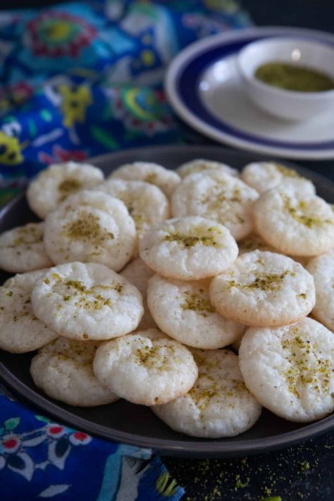 Shirini Nargili is a Persian coconut cookies made with a handful of ingredients. These cookies are naturally gluten-free and don't need any chilling time. Persian Desserts, Coconut Cookies Recipes, Persian Recipes, New Years Cookies, Walnut Cookies, Coconut Cookies, Delicious Cookie Recipes, Persian Food, Sweet Cookies